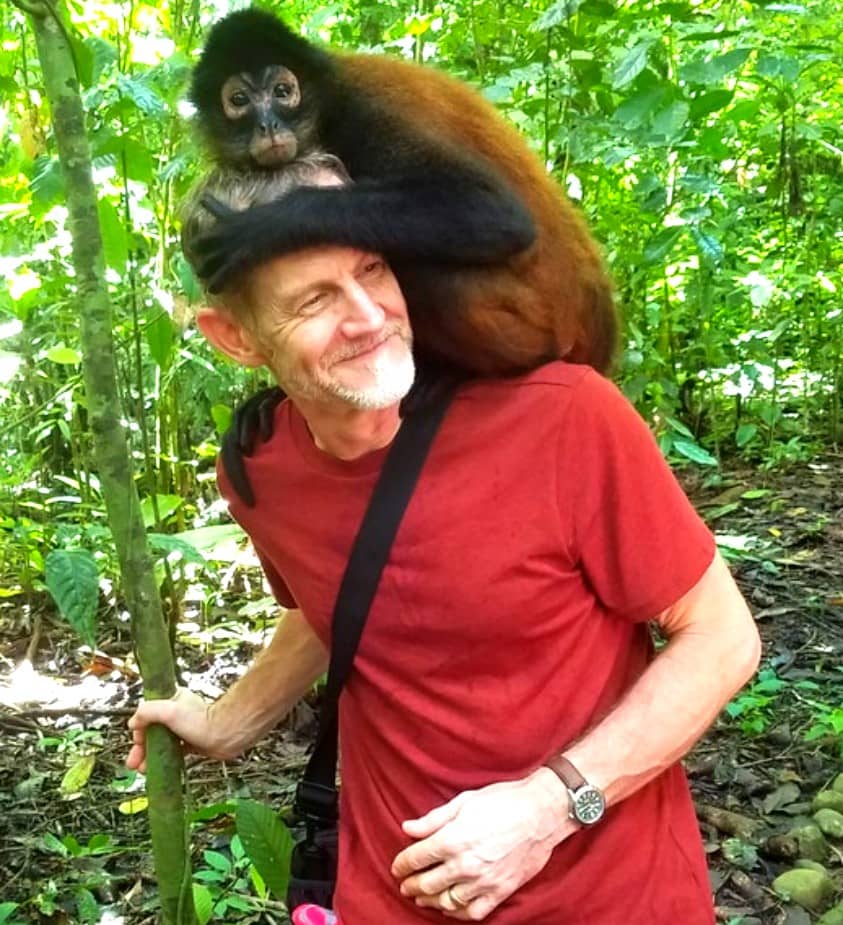 Man with monkey on shoulders