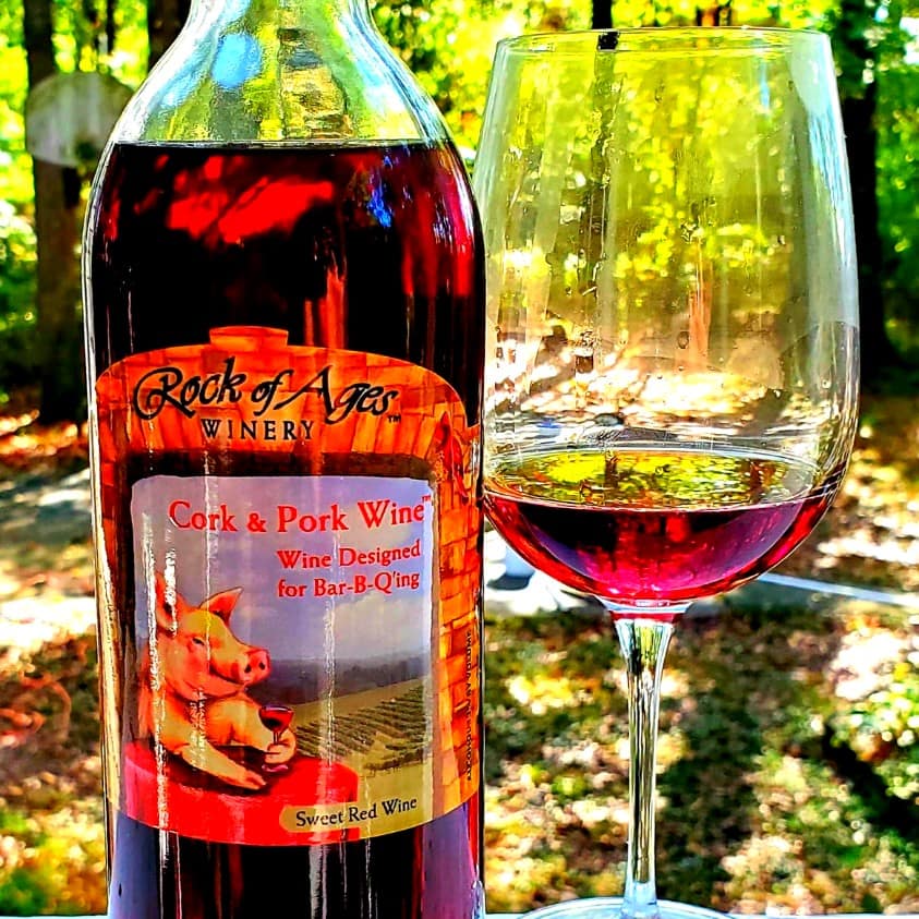 Bottle of wine and wine glass from Rock Of Ages Winery