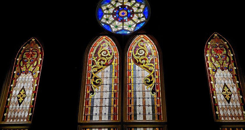 Stained glass windows on Abingdon church at night in virginia