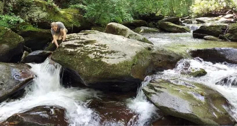 Gary playing in the river on the Virginia Creeper Trail