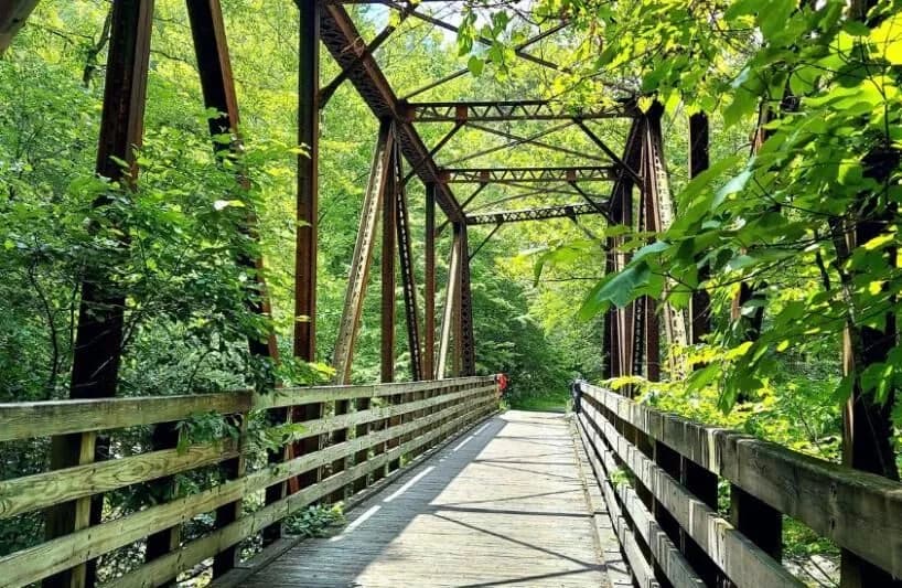 A bridge on the Virginia Creeper Trail in the summer.