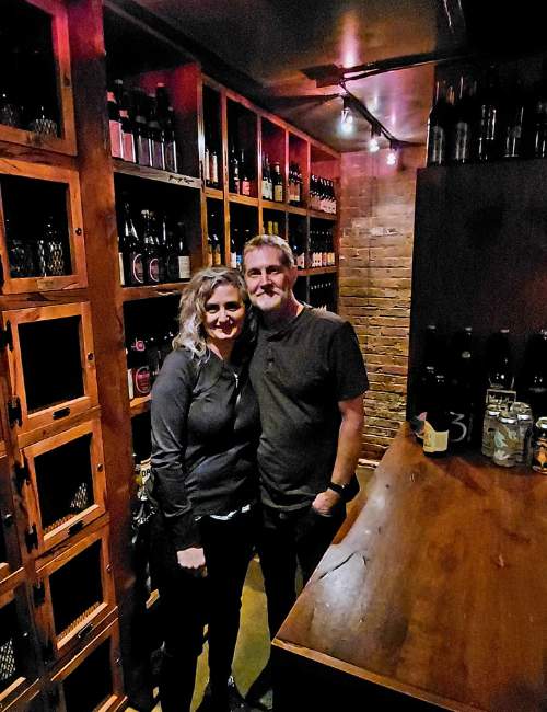 Kristen and Gary in and beer room at The Cellar at Duckworth's in Charlotte, NC