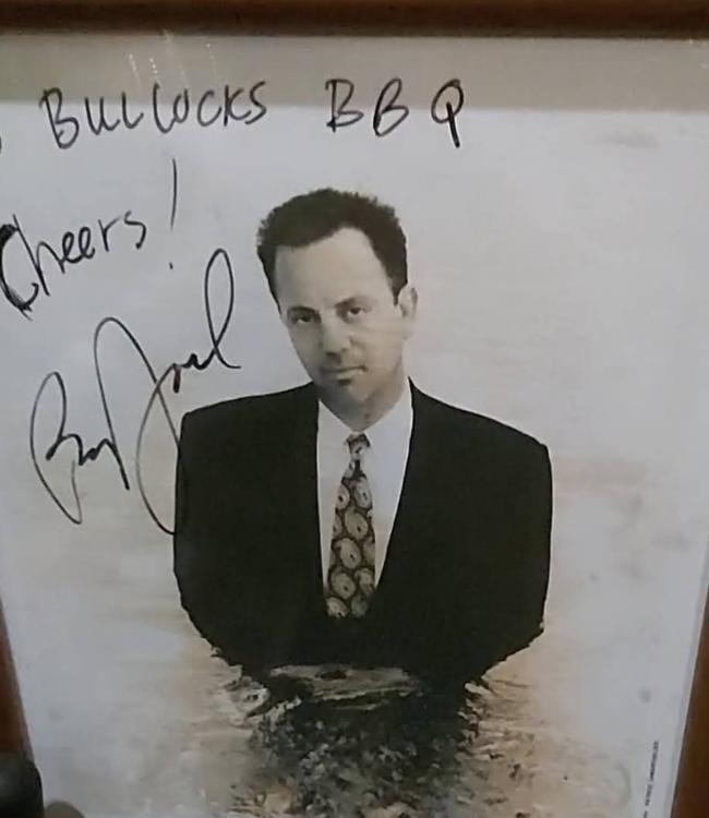 A signed picture of Billy Joel in Bullock's BBQ in Durham, NC