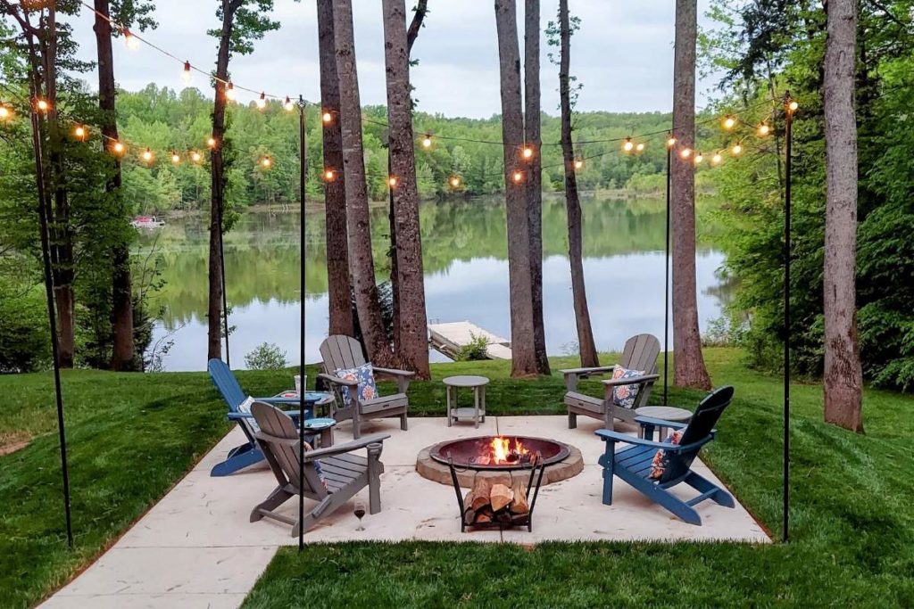 Fire pit overlooking Mayo Lake at Airbnb in North Carolina